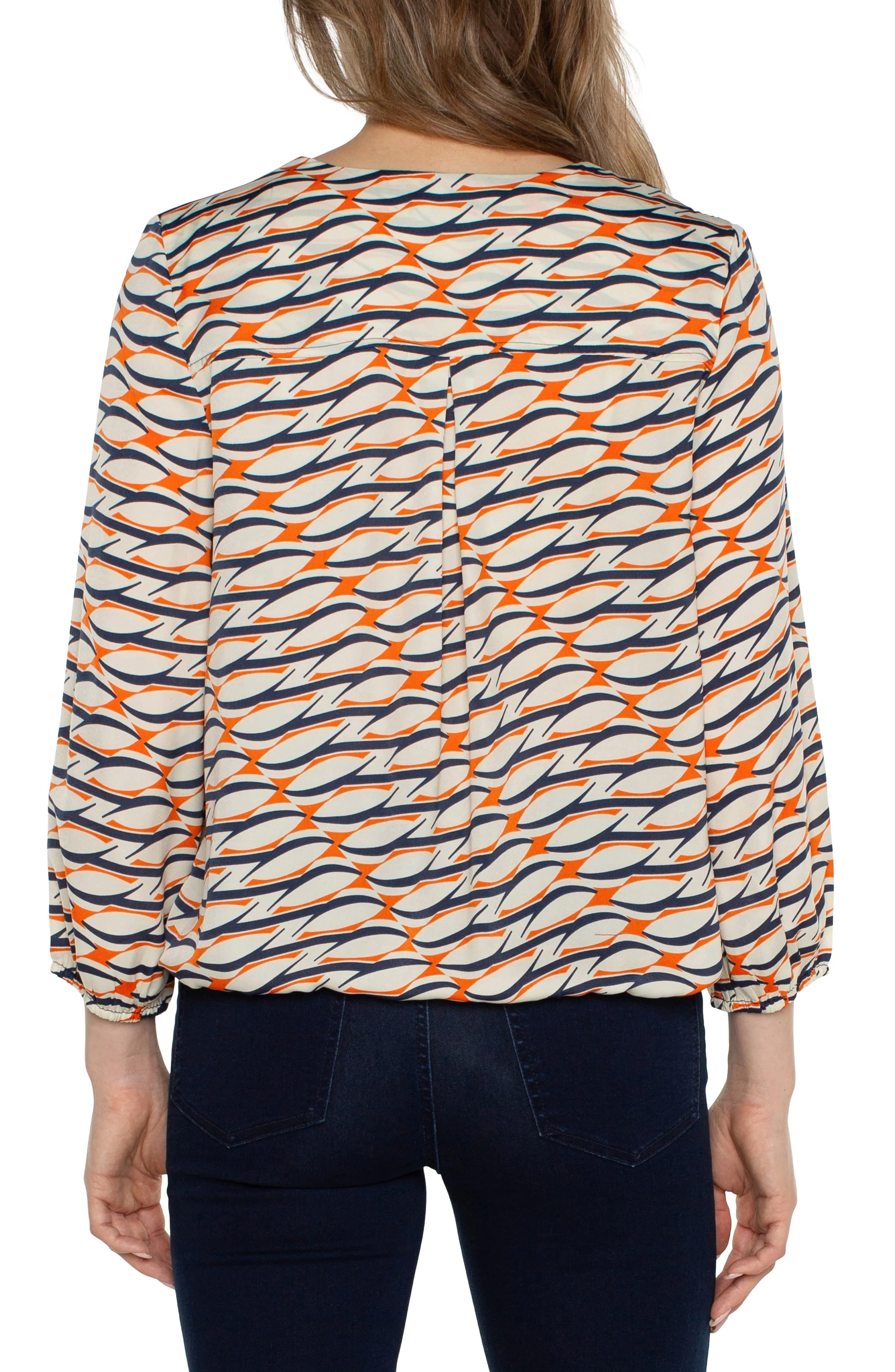 The Danae Geo Print Surplice Blouse